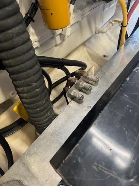 Slide: The Image of Engine room wiring and components of a 1988 Bertram 54 Convertible boat. - 25