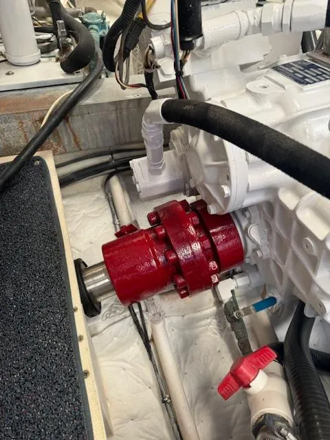 Slide: The Image of Engine room of 1988 Bertram 54 Convertible with red mechanical component. - 31