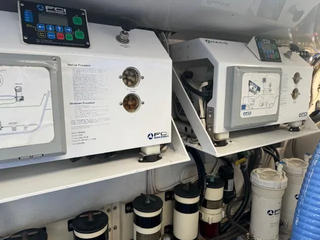 Slide: The Image of Engine room equipment in a 1988 Bertram 54 Convertible yacht. - 36