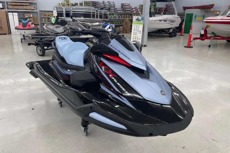 Slide: The Image of 2025 Yamaha WaveRunner VX Cruise jet ski displayed in showroom. - 1