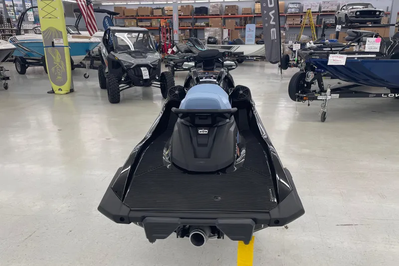 Slide: The Image of 2025 Yamaha WaveRunner VX Cruise in showroom, surrounded by boats and vehicles. - 5