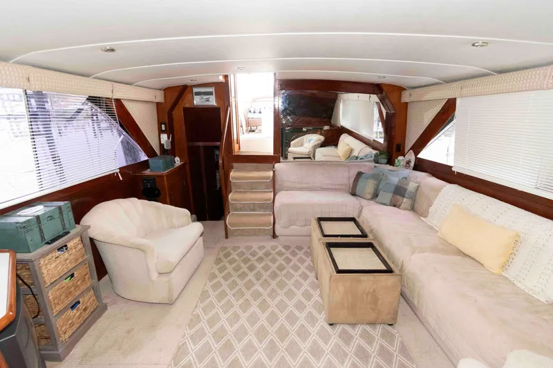 Slide: The Image of Luxurious interior of 1985 Ocean Yachts 46 Sunliner with plush seating and elegant decor. - 12