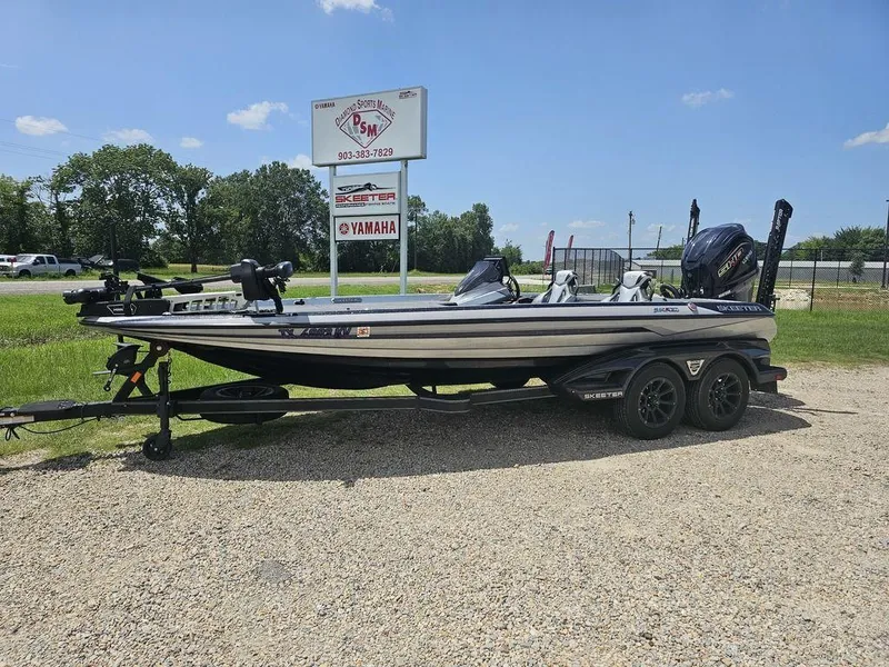 The Image of 2025 Skeeter FXR21 PRO boat on trailer at Diamond Sports Marine dealership. - 0