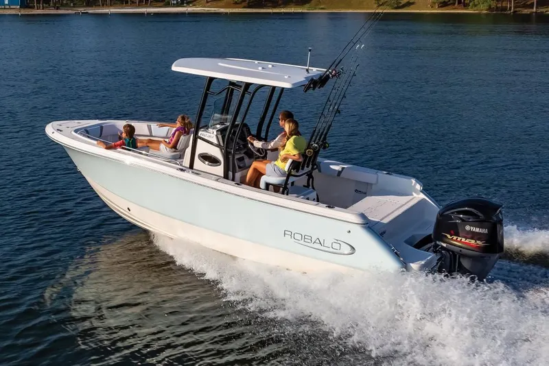 Slide: The Image of Manufacturer Provided Image: 2020 Robalo R230 Center Console boat cruising on a lake with passengers. - 18