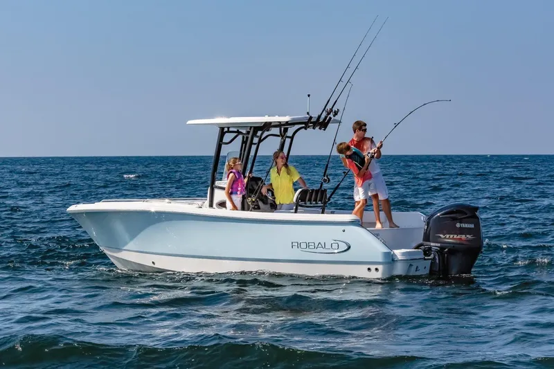 Slide: The Image of Manufacturer Provided Image: 2020 Robalo R230 Center Console boat with people fishing on the ocean. - 19