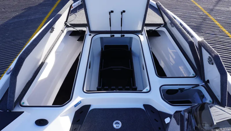 Slide: The Image of 2025 Ranger Z520 boat storage compartments open, showcasing spacious interior design. - 12