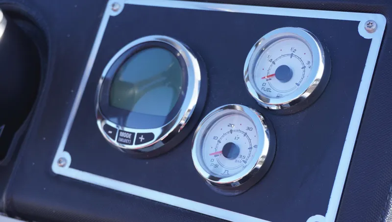 Slide: The Image of Dashboard of 2025 Ranger Z520 boat with digital and analog gauges. - 4