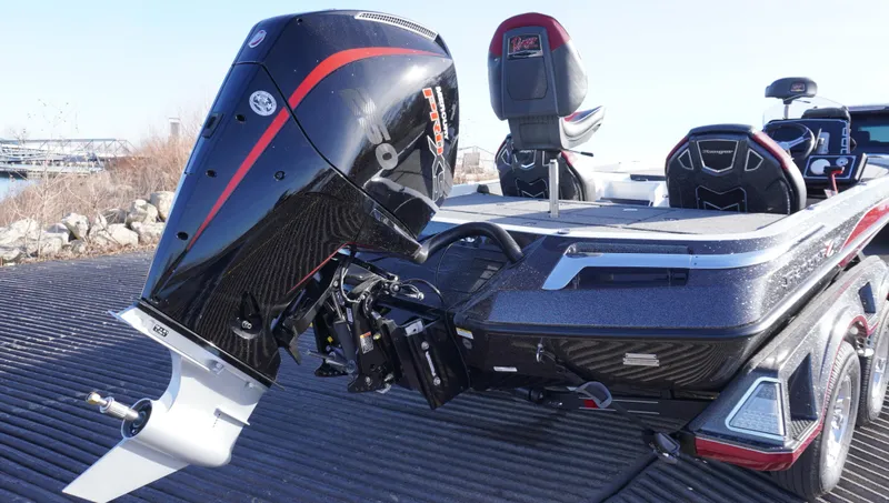 Slide: The Image of 2025 Ranger Z520 boat with powerful outboard motor, sleek design, and modern seating. - 5