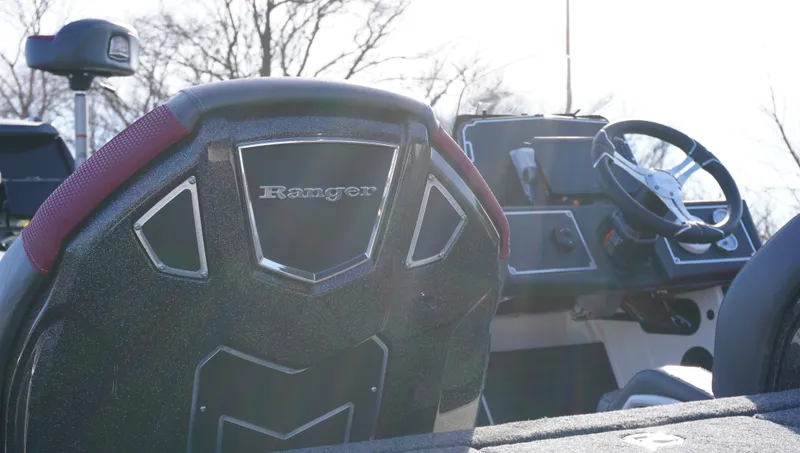 Slide: The Image of 2025 Ranger Z520 boat interior with steering wheel and dashboard, showcasing modern design. - 7