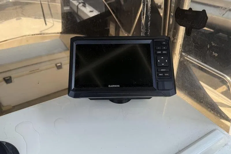 Slide: The Image of Garmin GPS device on 1996 Parker 18 CC boat dashboard. - 10