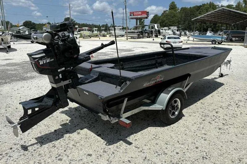 Slide: The Image of 2025 Gator Tail 1860 Extreme boat on trailer in outdoor lot. - 14