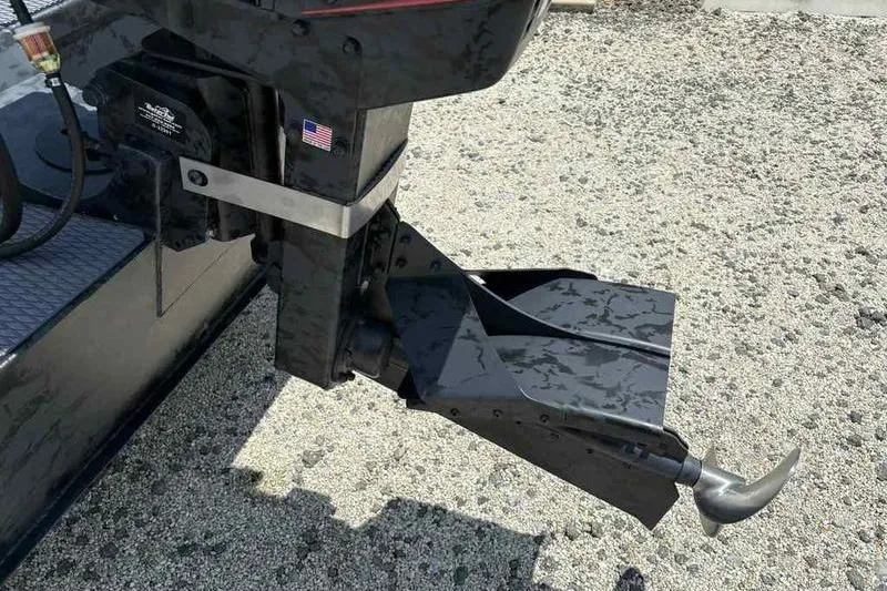 Slide: The Image of 2025 Gator Tail 1860 Extreme boat motor on gravel surface. - 5