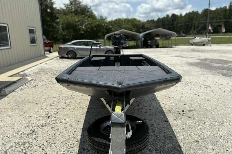 Slide: The Image of 2025 Gator Tail 1860 Extreme boat on trailer in outdoor setting. - 8