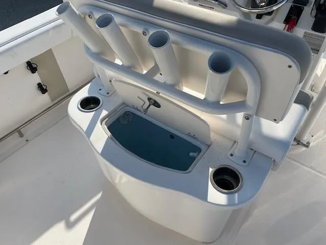 Slide: The Image of 2016 Robalo 2220 Center Console boat with rod holders and livewell. - 10