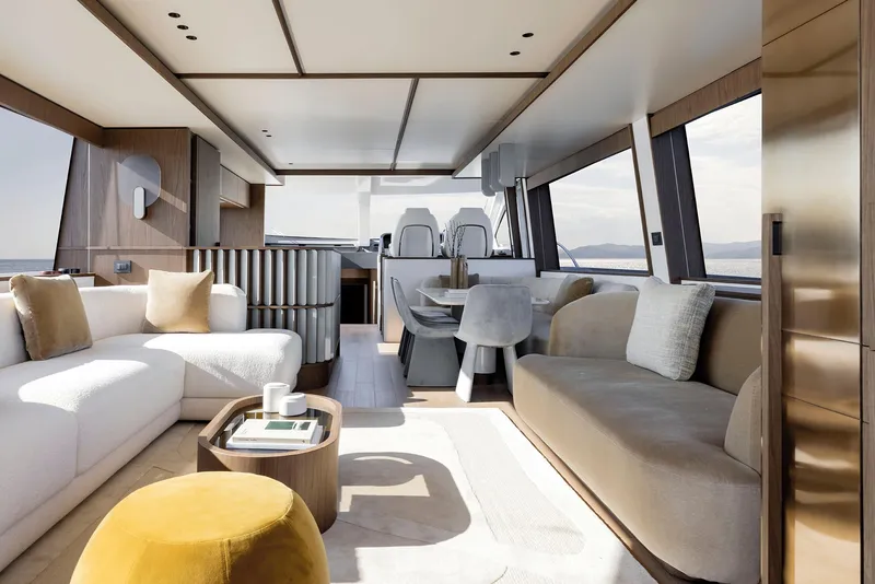 Slide: The Image of Luxurious interior of 2025 Azimut Fly 72 yacht with modern furnishings and panoramic windows. - 13
