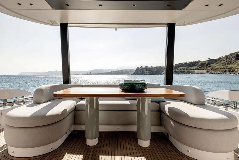 Slide: The Image of Luxurious 2025 Azimut Fly 72 yacht deck with elegant seating and ocean view. - 23