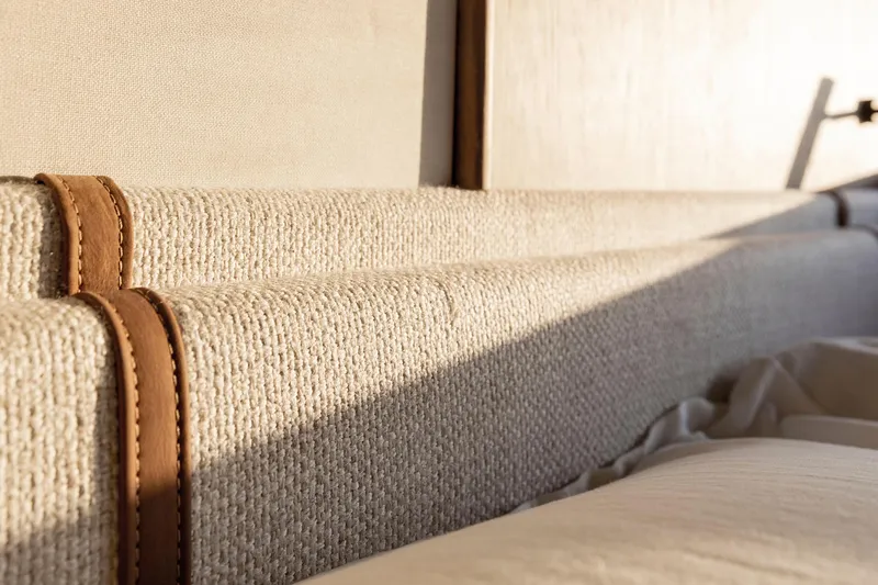 Slide: The Image of Luxurious interior detail of 2025 Azimut Fly 72 yacht with elegant fabric and leather accents. - 25