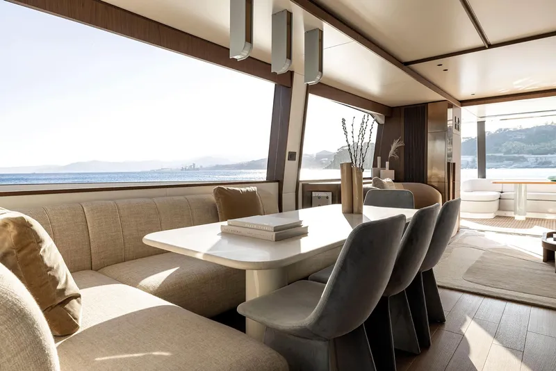 Slide: The Image of Luxurious interior of 2025 Azimut Fly 72 yacht with elegant dining area and ocean view. - 28