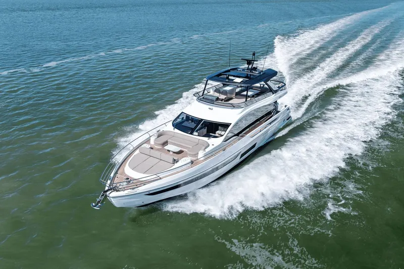 Slide: The Image of 2025 Azimut Fly 72 yacht cruising on open water, showcasing sleek design and luxury. - 3