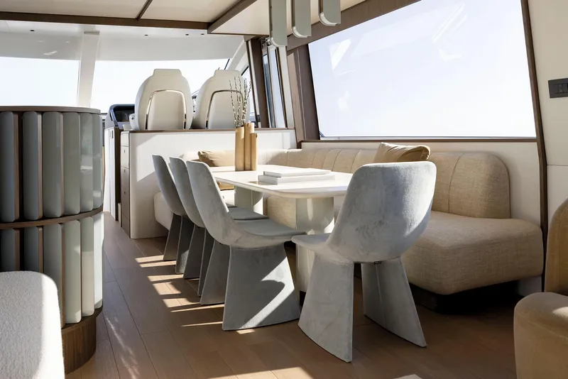 Slide: The Image of Luxurious interior of 2025 Azimut Fly 72 yacht with modern dining area. - 30