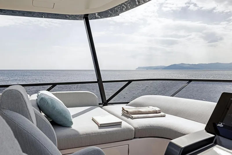 Slide: The Image of Luxurious Azimut Fly 72 yacht interior, 2025 model, with ocean view and elegant seating. - 43
