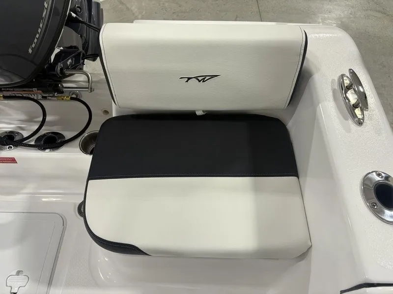 Slide: The Image of 2026 Tidewater 180 CC Adventure boat seat with black and white upholstery. - 13