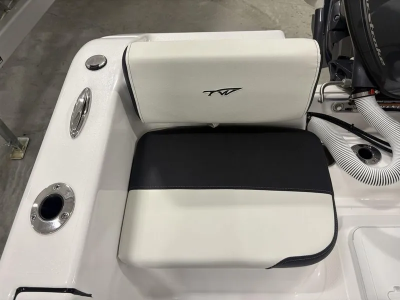 Slide: The Image of 2026 Tidewater 180 CC Adventure boat seat with black and white upholstery. - 17