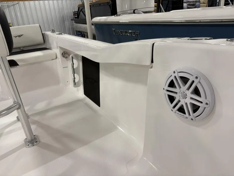 Slide: The Image of 2026 Tidewater 180 CC Adventure boat interior with speaker and seating detail. - 18