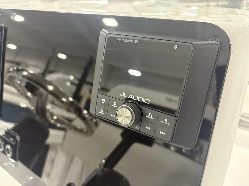 Slide: The Image of JL Audio system on 2026 Tidewater 180 CC Adventure boat dashboard. - 20