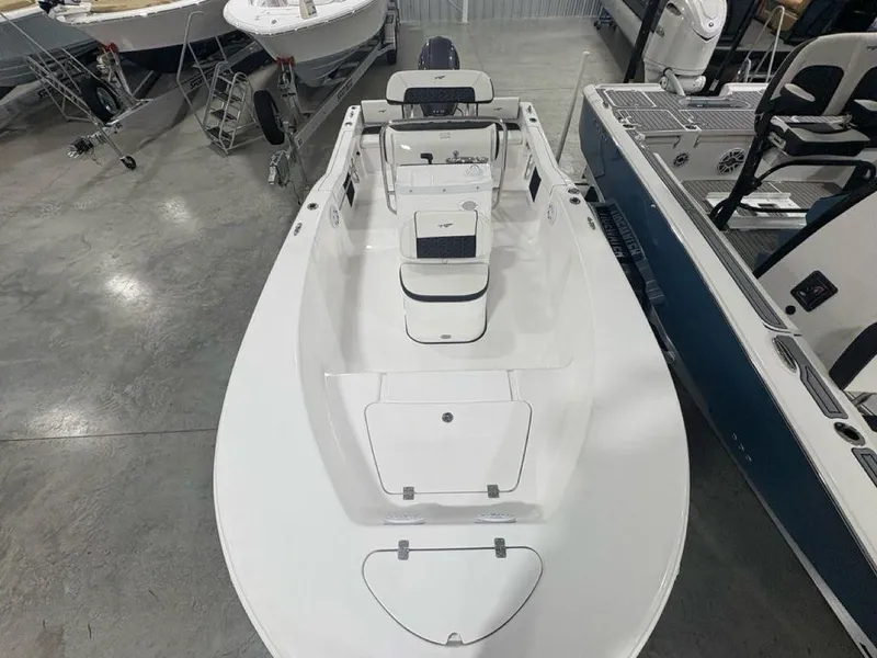 Slide: The Image of 2026 Tidewater 180 CC Adventure boat in showroom, top view. - 23
