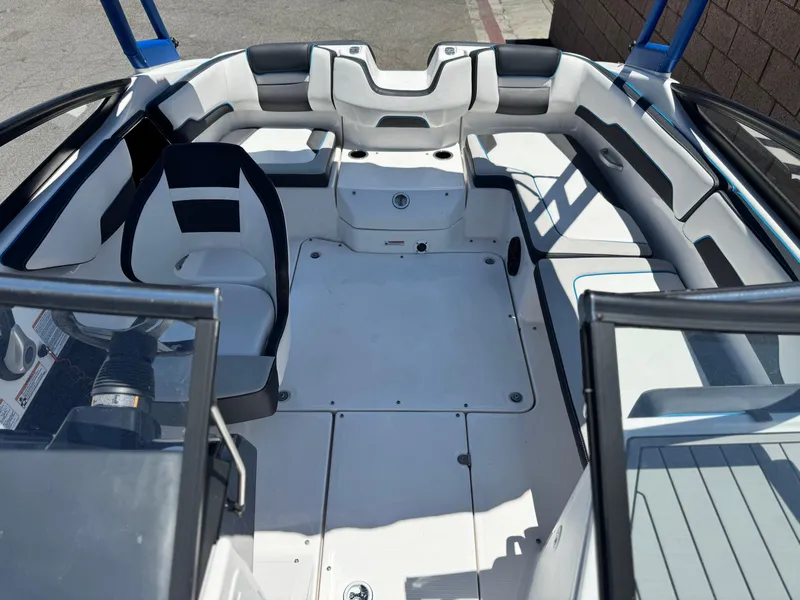 Slide: The Image of 2020 Yamaha Boats AR195 interior with spacious seating and modern design. - 14