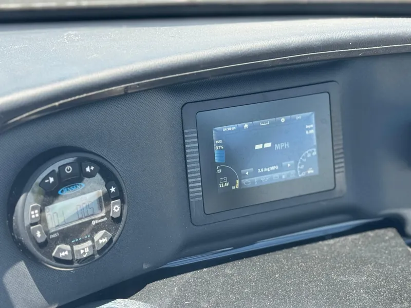 Slide: The Image of Dashboard of 2020 Yamaha AR195 boat with digital display and controls. - 25
