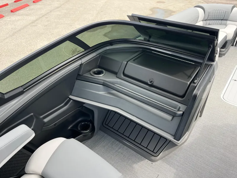 Slide: The Image of 2026 Avalon 2785 Excalibur LTD boat interior with windshield and seating area. - 11