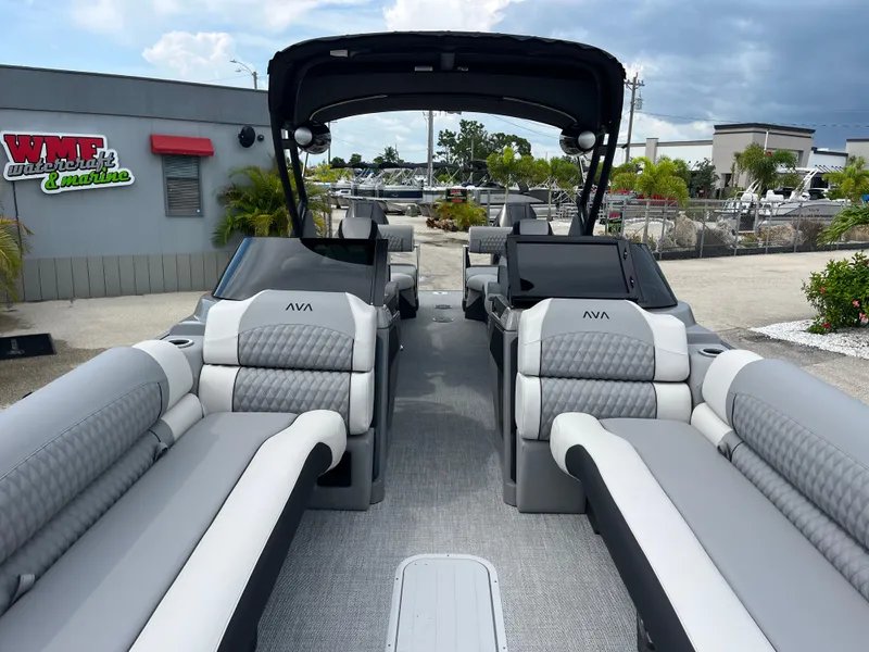 Slide: The Image of 2026 Avalon 2785 Excalibur LTD boat with luxurious seating and twin Mercury 400hp engines. - 14