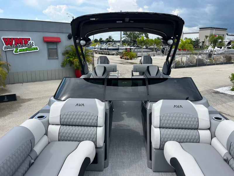 Slide: The Image of Luxurious 2026 Avalon 2785 Excalibur LTD boat with quad lounger seating and windshield. - 15