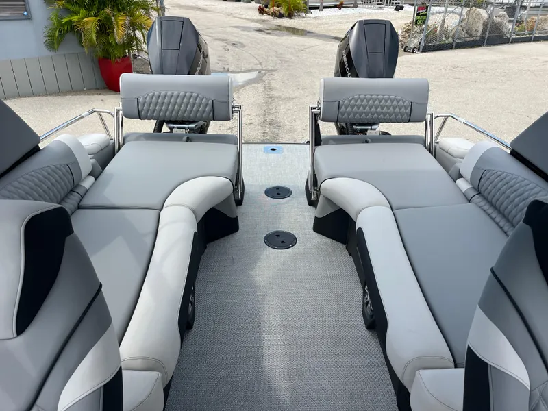 Slide: The Image of Luxurious 2026 Avalon 2785 Excalibur LTD boat with quad loungers and twin Mercury 400hp engines. - 18