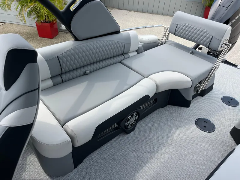 Slide: The Image of Luxurious seating on 2026 Avalon 2785 Excalibur LTD boat, featuring elegant gray upholstery. - 19