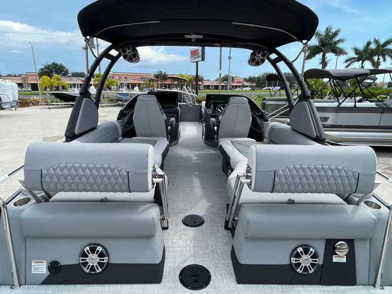 Slide: The Image of Luxurious 2026 Avalon 2785 Excalibur LTD boat interior with quad loungers and premium seating. - 9