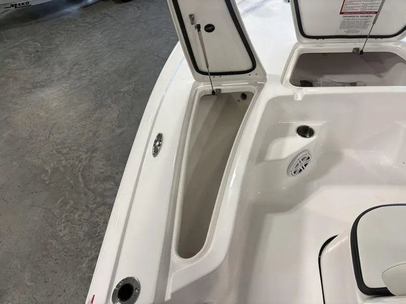 Slide: The Image of Open storage compartments on a 2026 Tidewater 1910 BM boat deck. - 11