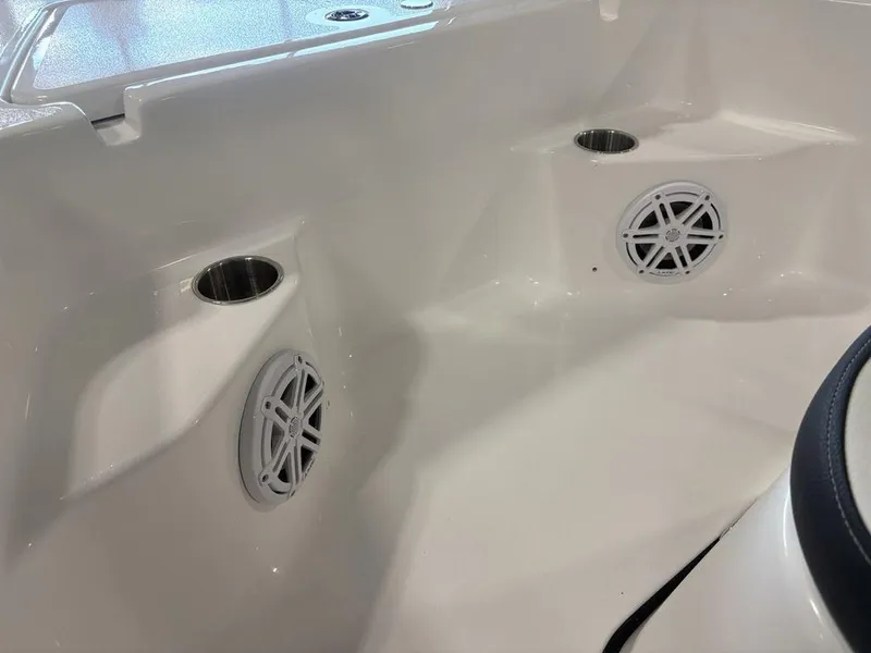 Slide: The Image of 2026 Tidewater 1910 BM boat interior with speakers and cup holders. - 13