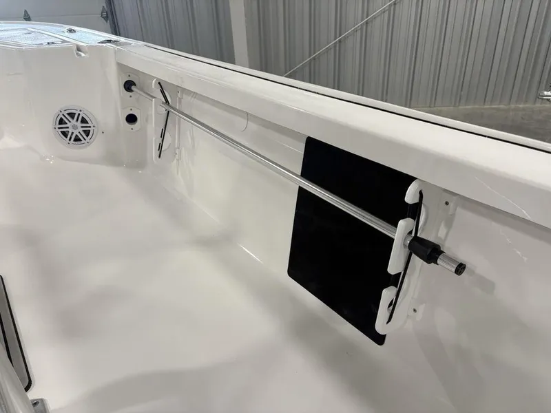 Slide: The Image of 2026 Tidewater 1910 BM boat interior with rod holder and speaker. - 19