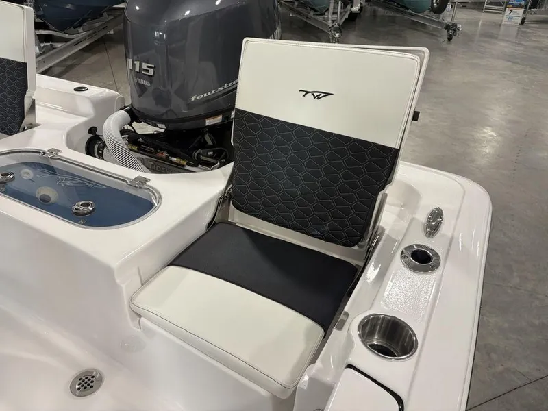 Slide: The Image of 2026 Tidewater 1910 BM boat interior with Yamaha 115 engine and stylish seating. - 23