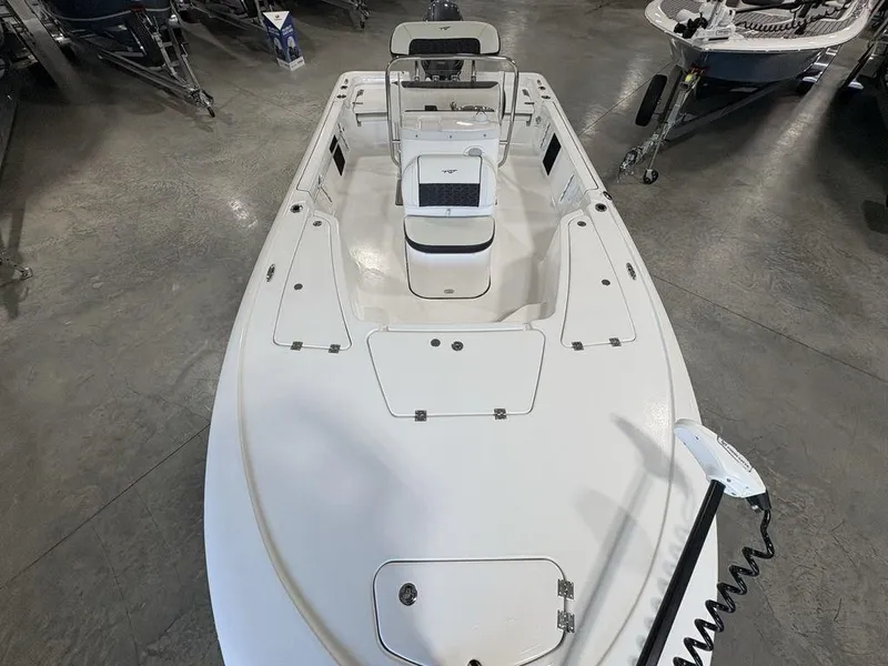 Slide: The Image of 2026 Tidewater 1910 BM boat interior with seating and storage compartments. - 26