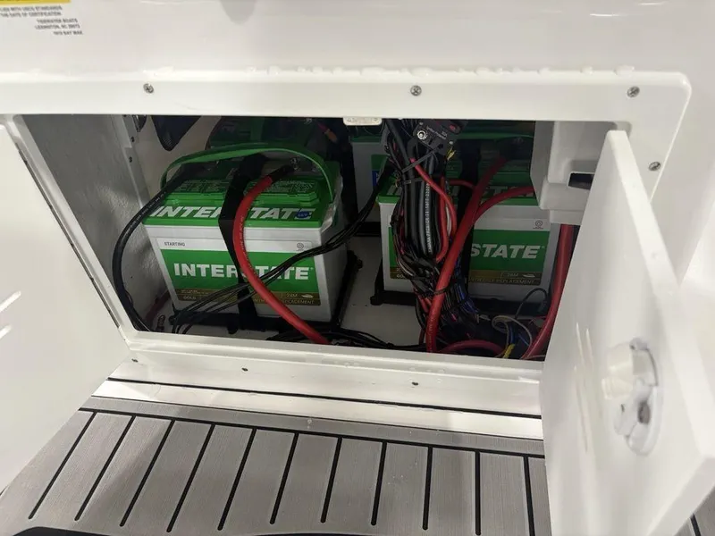 Slide: The Image of Battery compartment of 2026 Tidewater 1910 BM boat with Interstate batteries and wiring. - 27