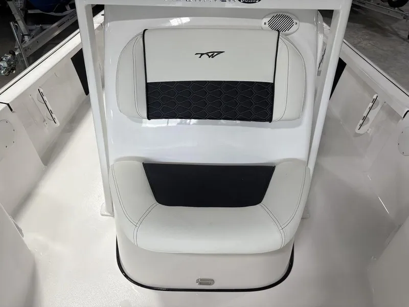 Slide: The Image of 2026 Tidewater 2110 BM boat seat with black and white upholstery. - 15