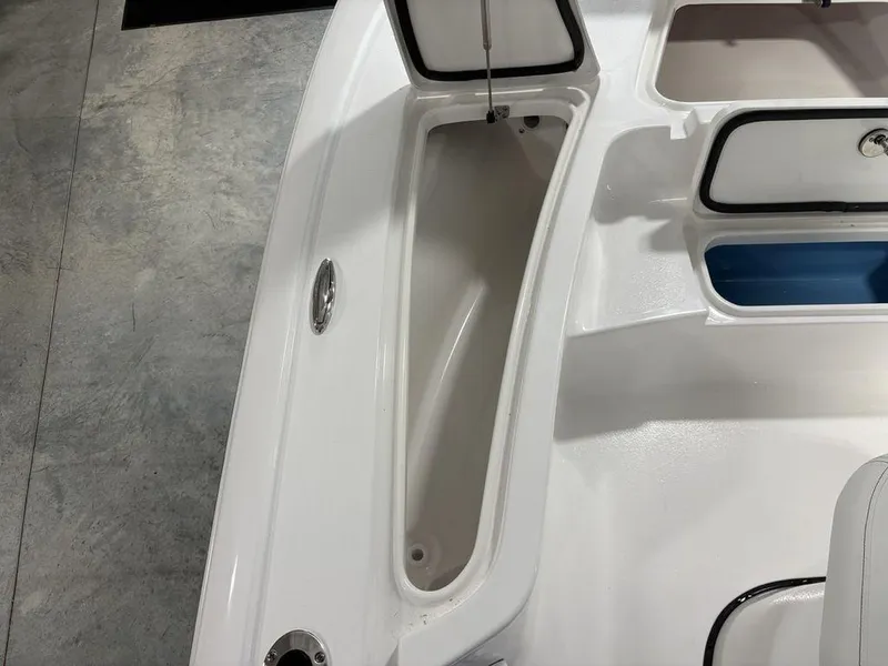 Slide: The Image of 2026 Tidewater 2110 BM boat interior storage compartments and seating area. - 3