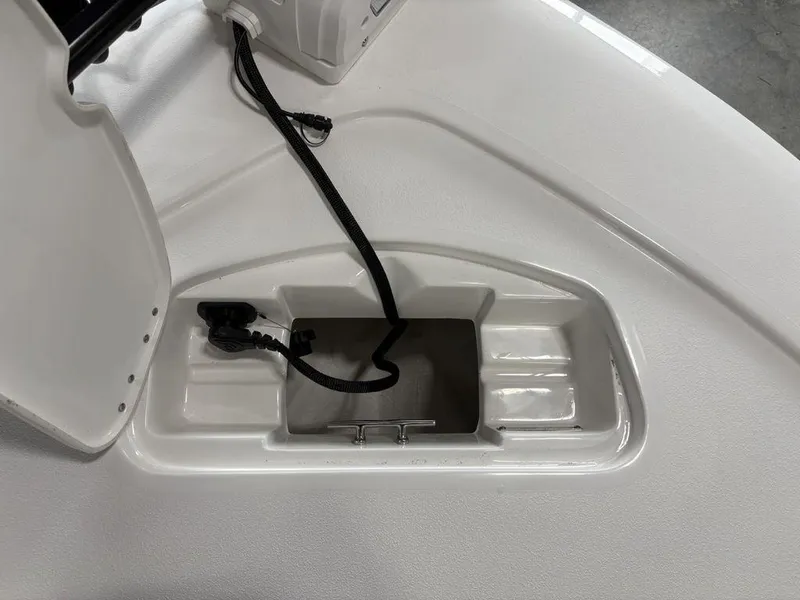 Slide: The Image of 2026 Tidewater 2110 BM boat compartment with wiring and open hatch. - 7