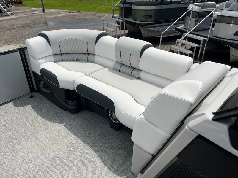 Slide: The Image of Luxurious seating on 2026 Avalon 2585 Catalina Windshield Quad Lounger boat, featuring elegant upholstery. - 13