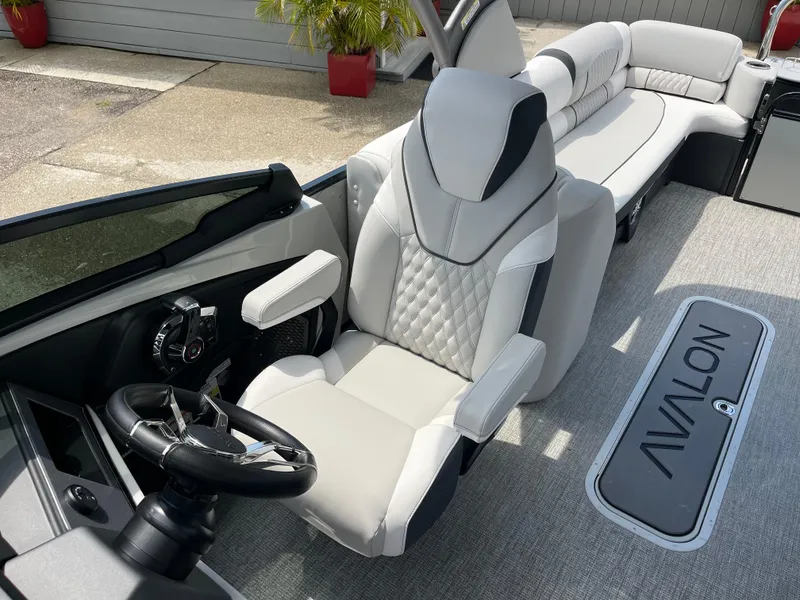 Slide: The Image of Luxurious interior of 2026 Avalon 2585 Catalina Windshield Quad Lounger with plush seating and modern controls. - 16