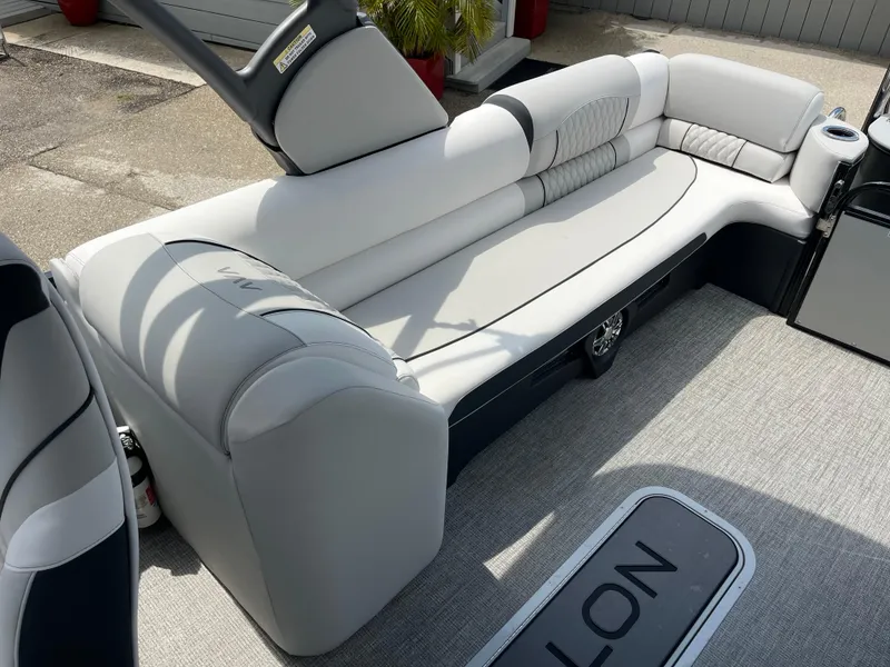 Slide: The Image of Luxurious seating on 2026 Avalon 2585 Catalina Windshield Quad Lounger with high-performance Mercury 400hp V-10. - 18